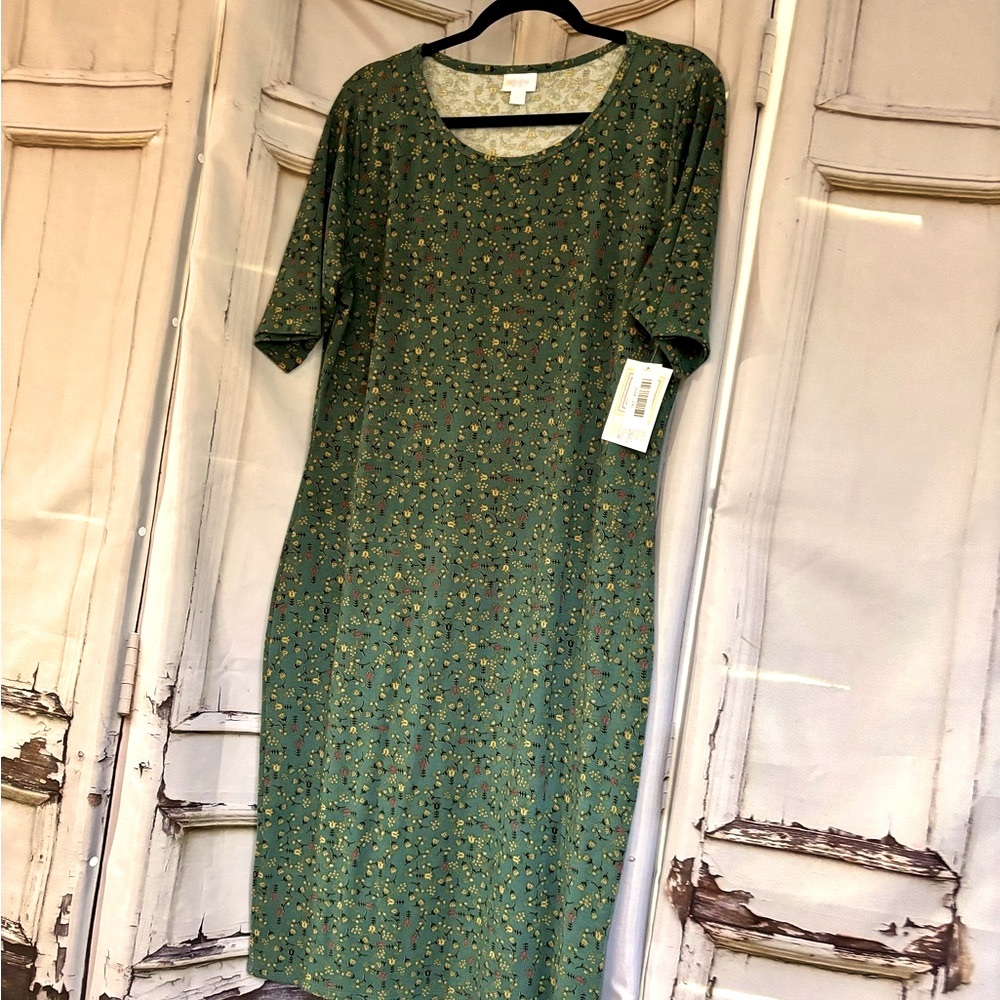 Lularoe Julia dress. 44”shoulder to hem.20”pit to pit bust.Rose flowers on green